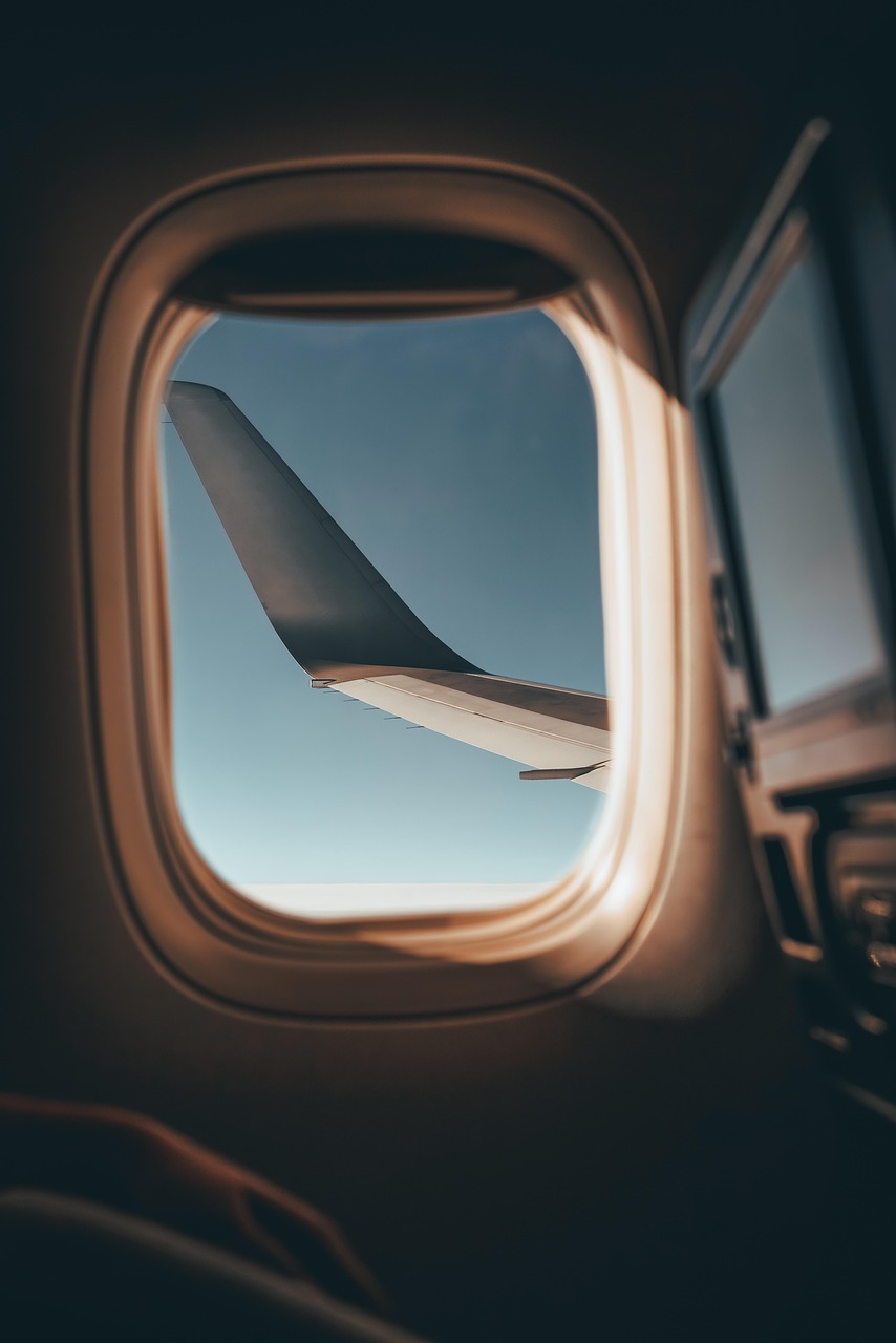 team-04 airplane, travel, adventure, exploration, window, flight, aircraft, plane, transportation, aviation, wing, fly, sky, transport, airline, tourism, nature, aeroplane