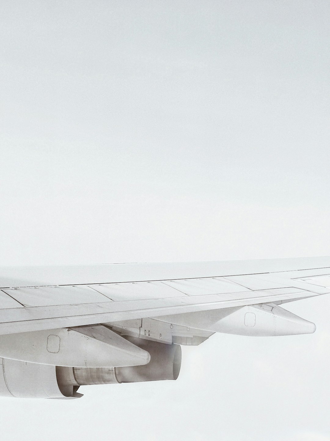 services-04 white-plane-wing-ibb0u6k0pay